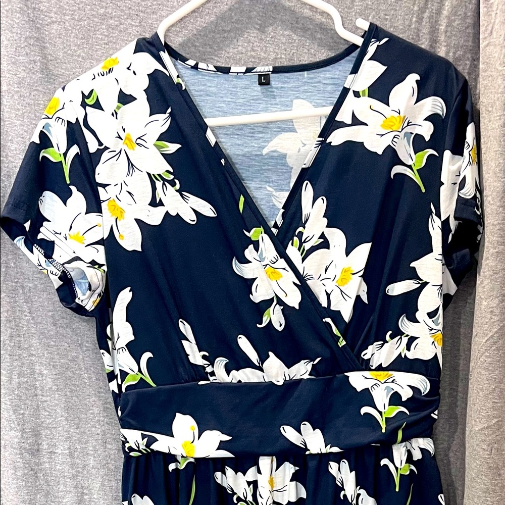 Navy with white floral print midi dress. Perfect for summer!